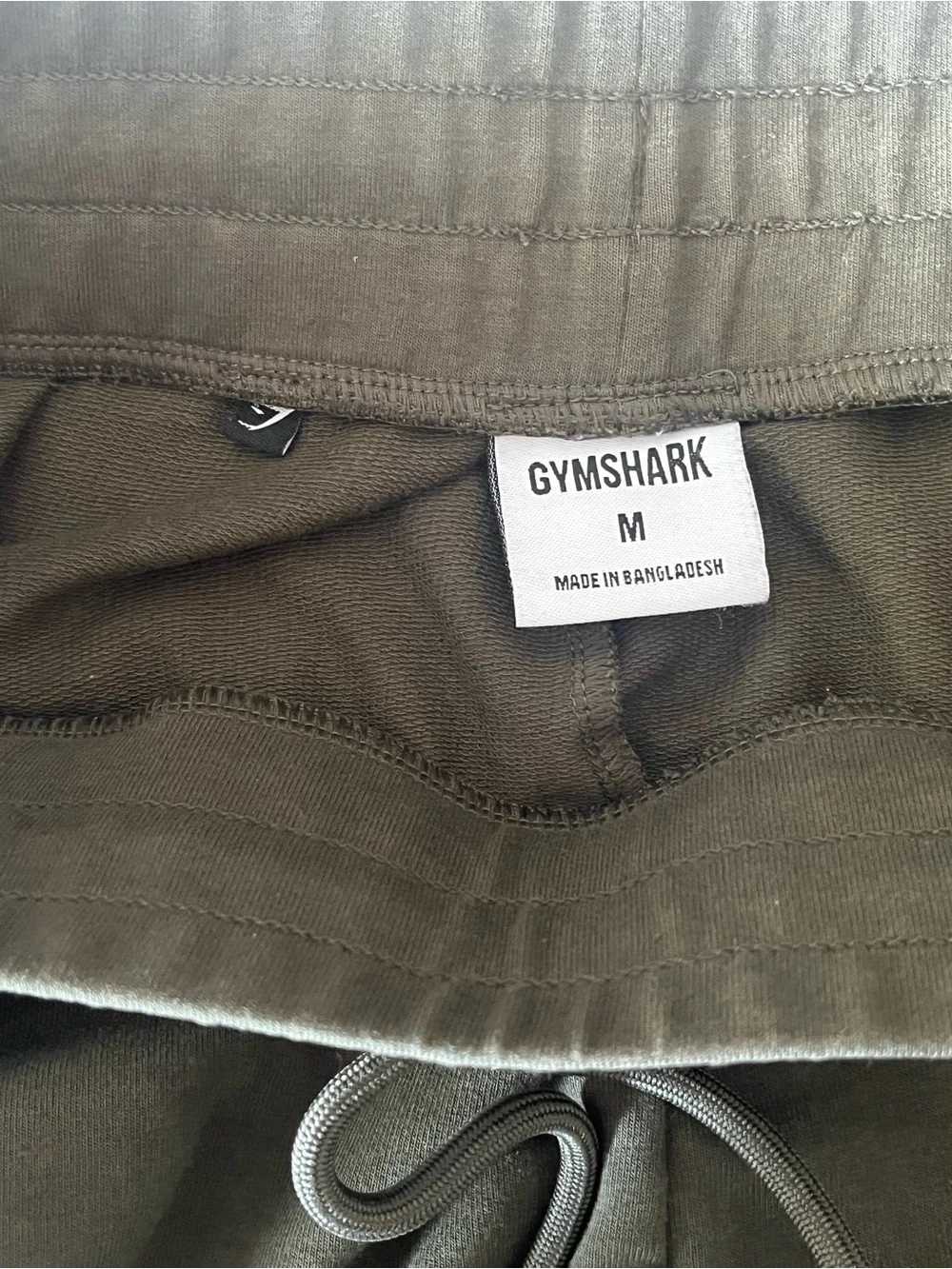 Gymshark men’s critical zip pocket military green tapered ankle pull on pants M